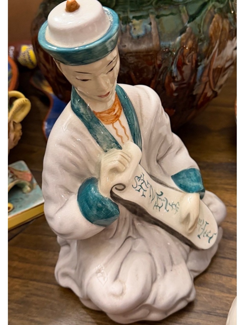 Asian woman porcelain figurine